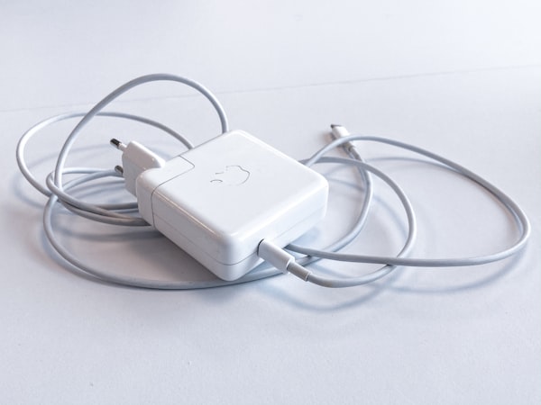 Anker Nano compact charger held between fingers
